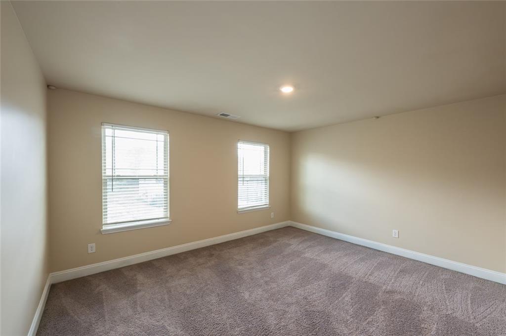 12172 Flannery Lane Hampton, GA 30228 - Photo 25 of 31 an empty room with windows