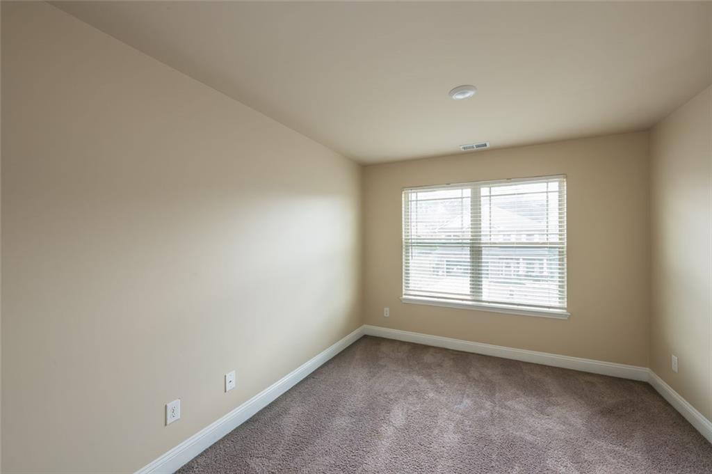 12172 Flannery Lane Hampton, GA 30228 - Photo 30 of 31 an empty room with a window
