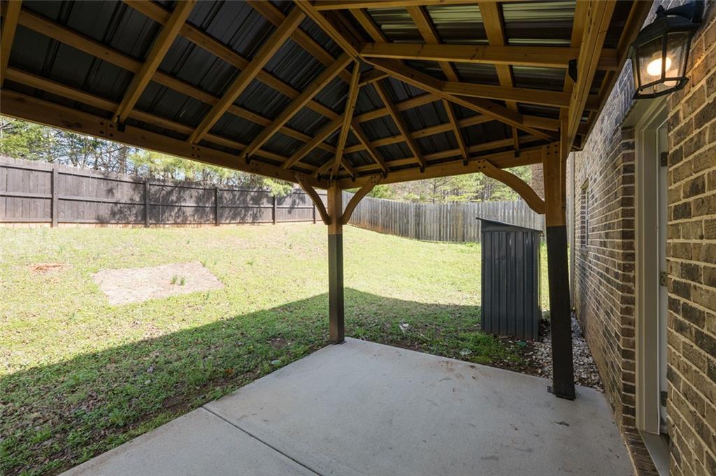 12172 Flannery Lane Hampton, GA 30228 - Photo 9 of 31 a view of a porch