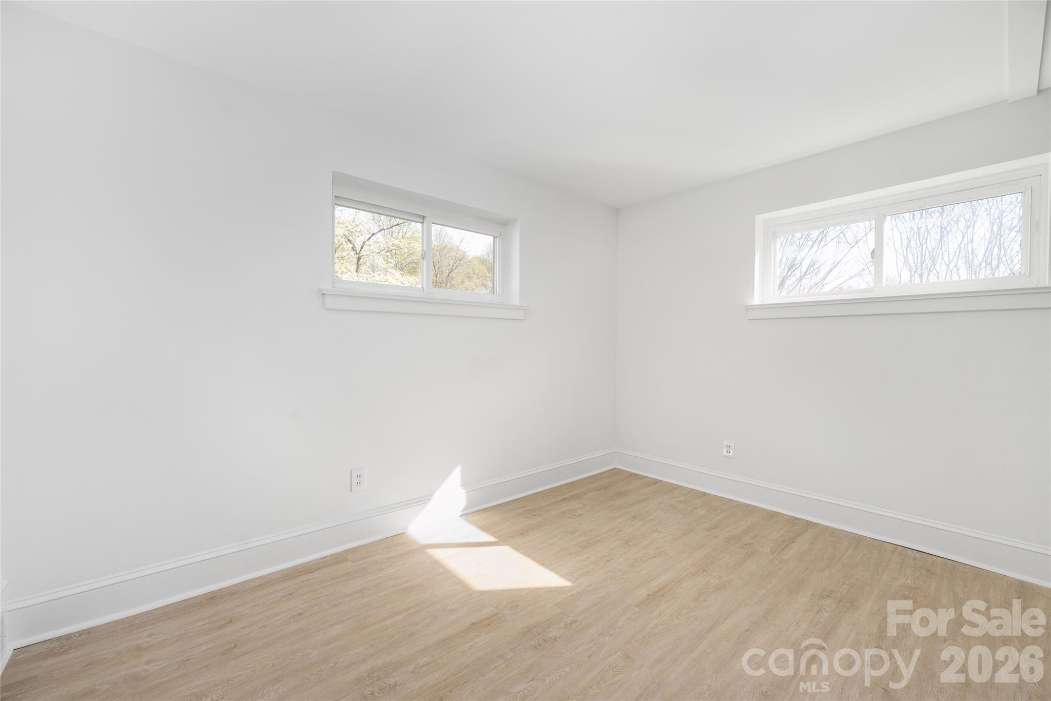 9424 Pembroke Road Huntersville, NC 28078 - Photo 30 of 39 an empty room with a window
