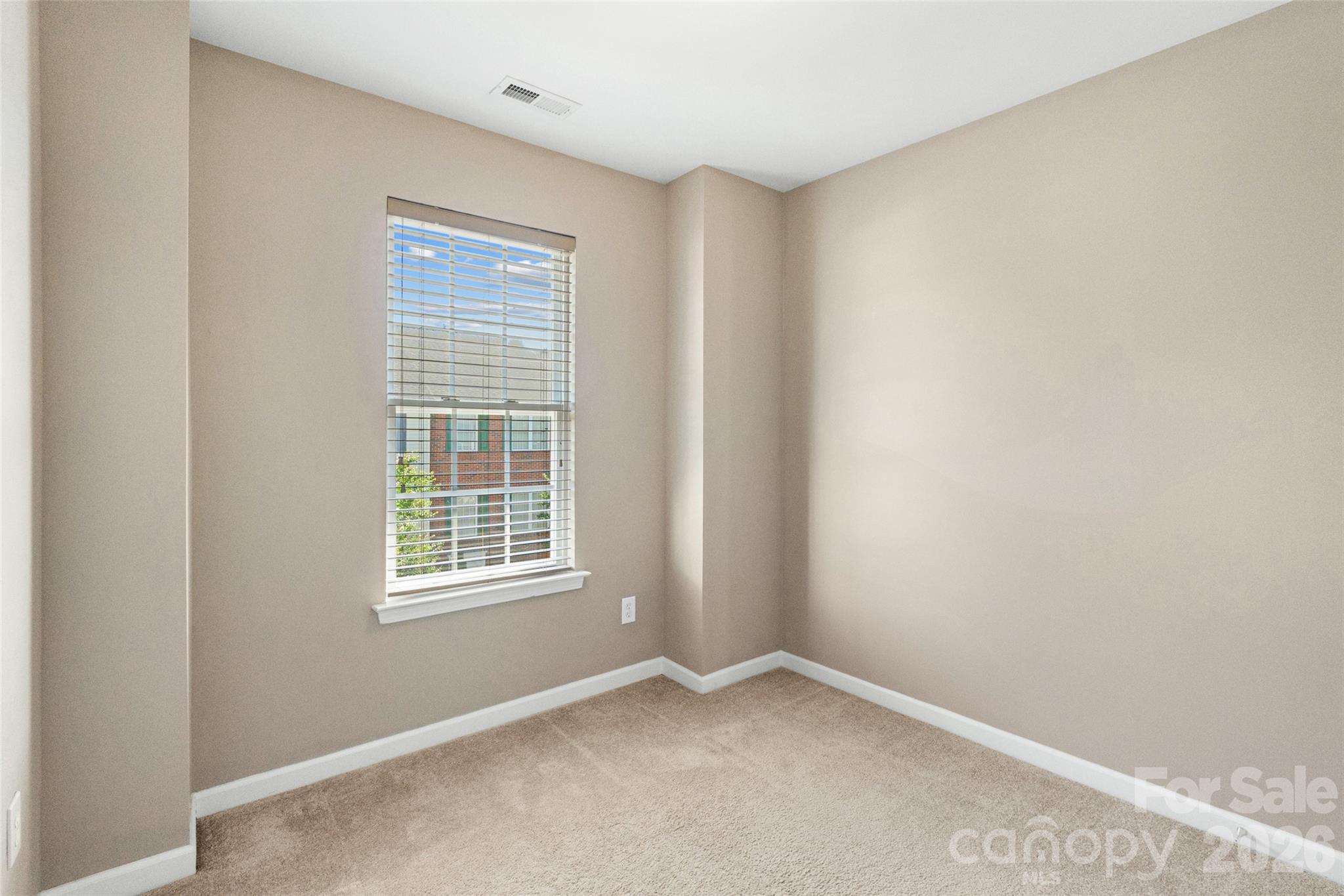 104 Rock Ridge Lane Mount Holly, NC 28120 - Photo 37 of 48 a view of an empty room with a window