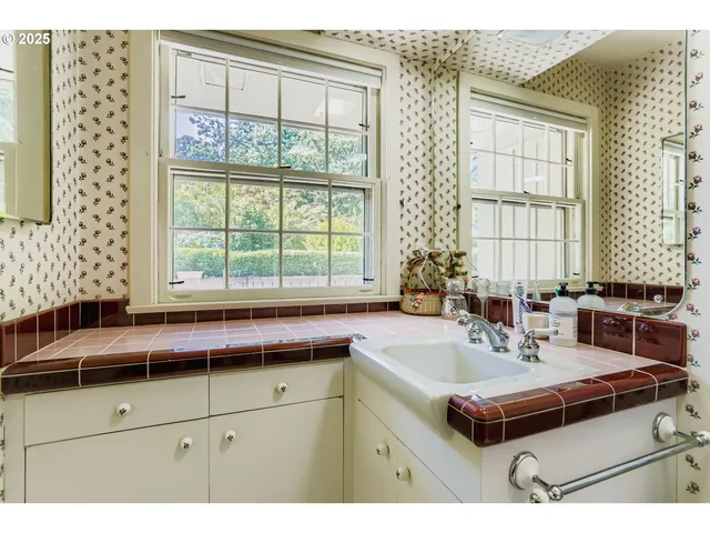 a kitchen with a sink and a window