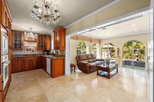 a view of a chairs and table in a patio