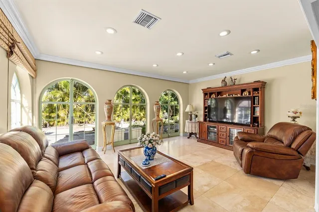 a view of a house with backyard and porch