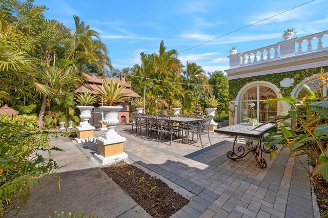 a view of a house with basketball court