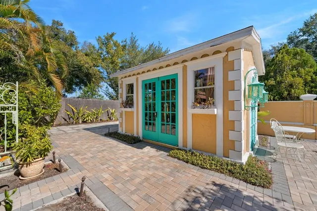 a view of entrance gate of a house