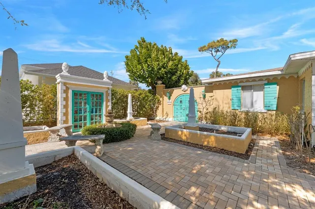 an aerial view of residential building with parking space