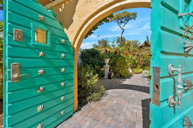 a living room with fireplace furniture and a wooden floor