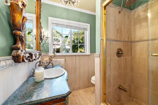 a bedroom with furniture and a wooden floor