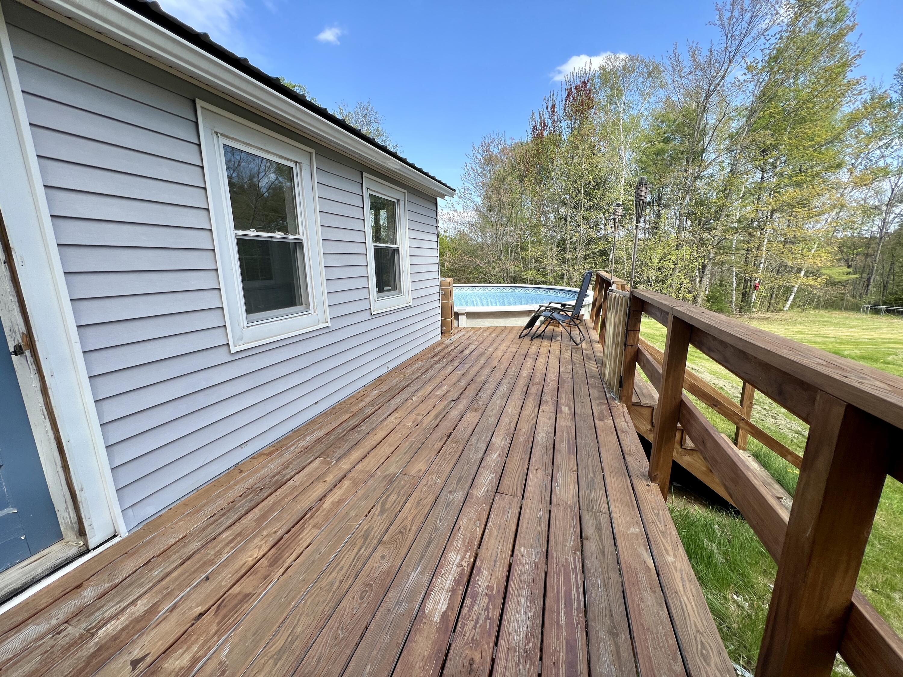 44 Lasselle Road Burnham, ME 04922 - Photo 8 of 29 Side deck to pool