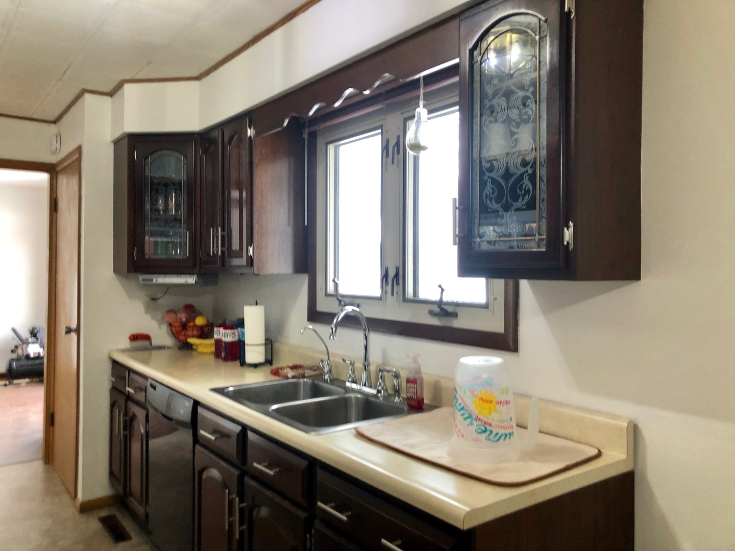 2463 North 2750W Road Kankakee, IL 60901 - Photo 3 of 13 a kitchen with a sink and a window