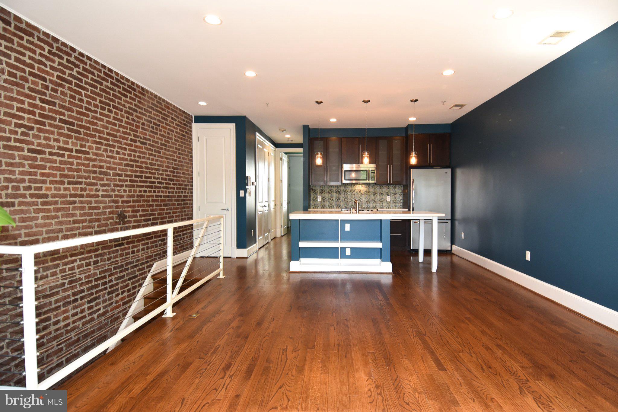1316 9th Street Northwest Washington, DC 20001 - Photo 34 of 44 Chic urban loft with exposed brick.