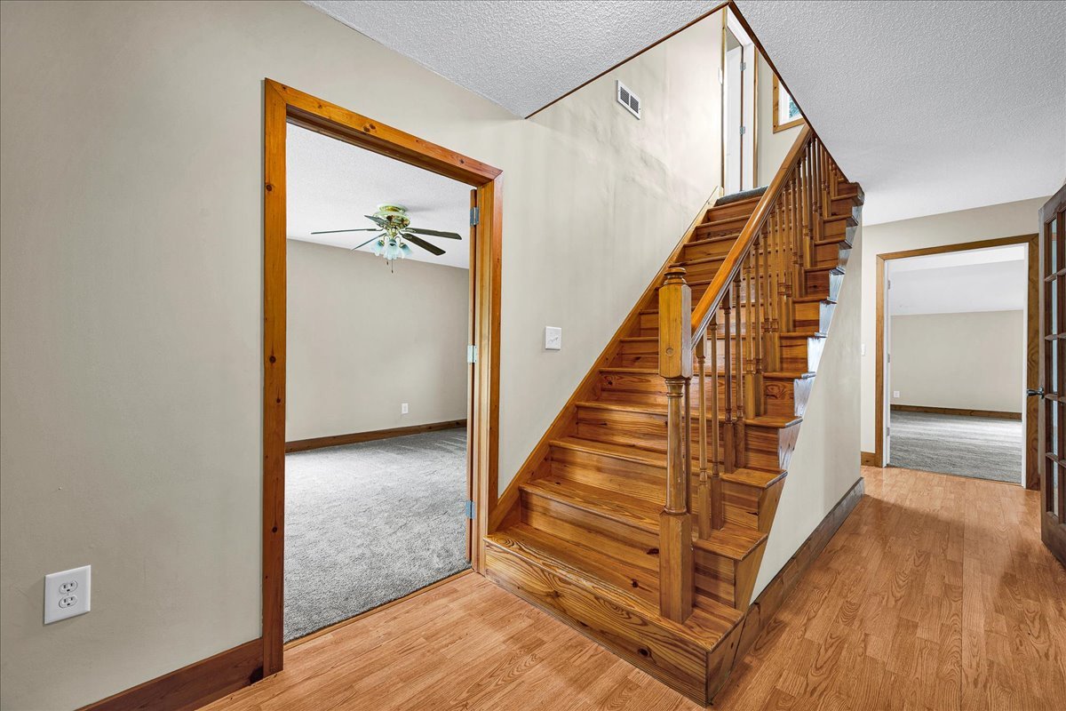 116 Lakeview Road East Galesburg, IL 61430 - Photo 3 of 36 a view of staircase with wooden floor and stairs