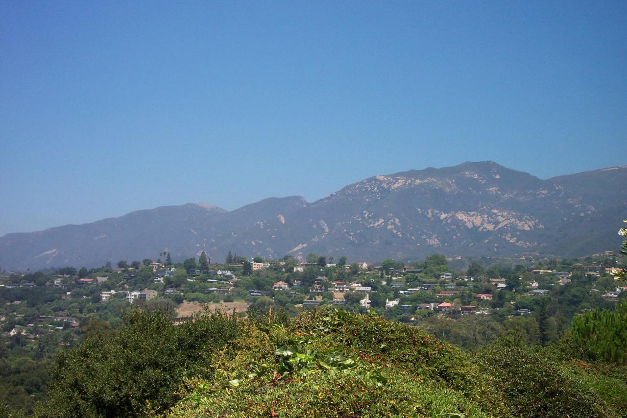 2174 Mission Ridge Road Santa Barbara, CA 93103 - Photo 1 of 12 an aerial view of residential house and green space