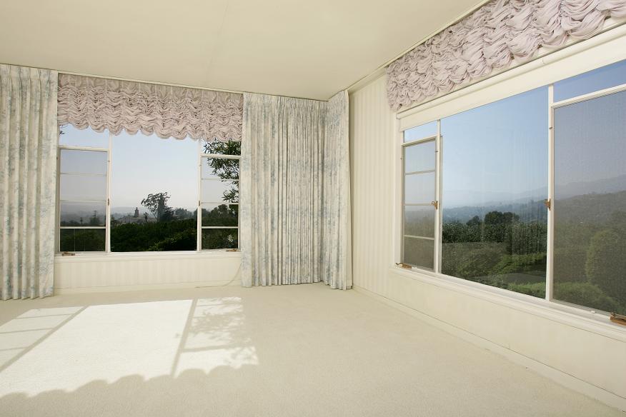 2174 Mission Ridge Road Santa Barbara, CA 93103 - Photo 5 of 12 a view of empty room with wooden floor and fan