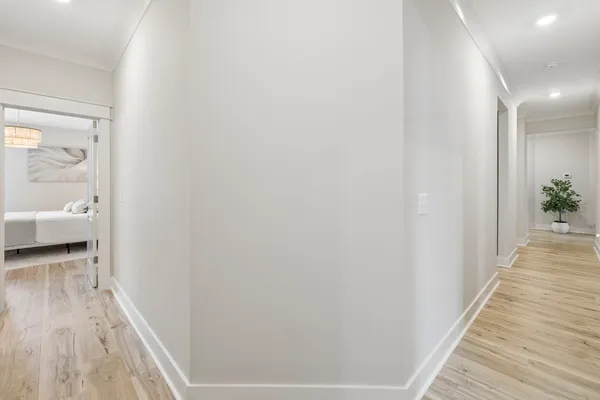 a view of a backyard with wooden fence