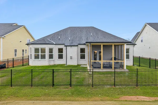 view of a house with a yard