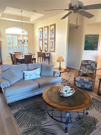 a living room with furniture and a table