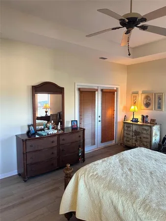 a bed room with a bed and a television