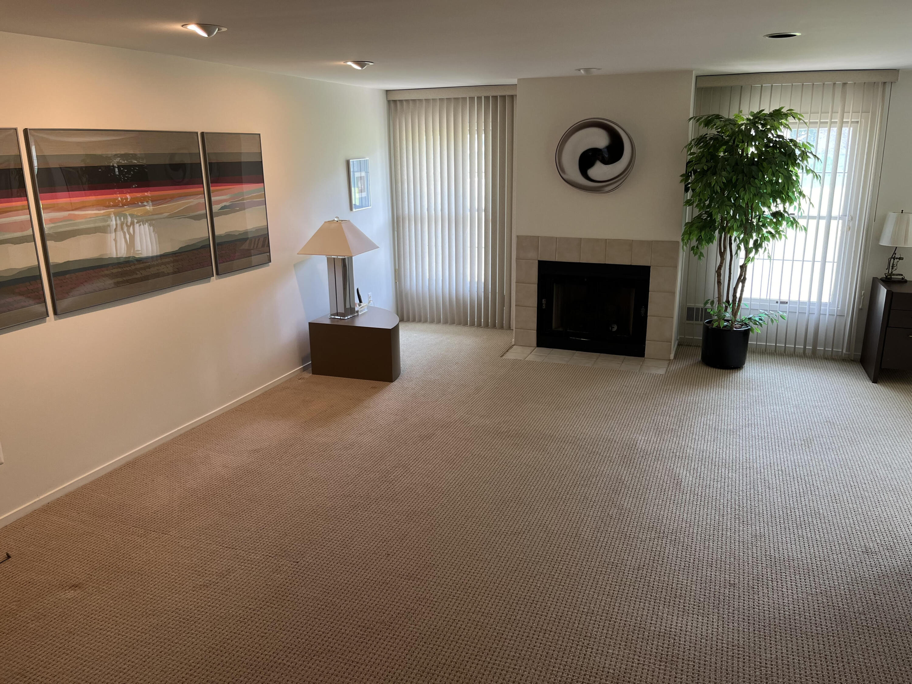 6355 Noble Road, Unit 5 West Bloomfield, MI 48322 - Photo 20 of 24 Lower fireplace
