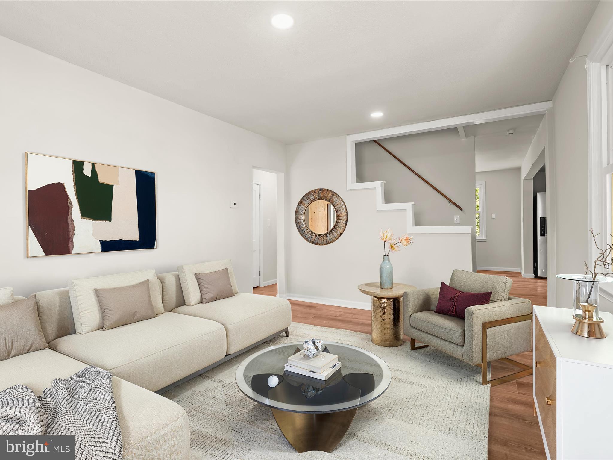 2608 Ambler Road Dundalk, MD 21222 - Photo 2 of 34 a living room with furniture a rug and a table