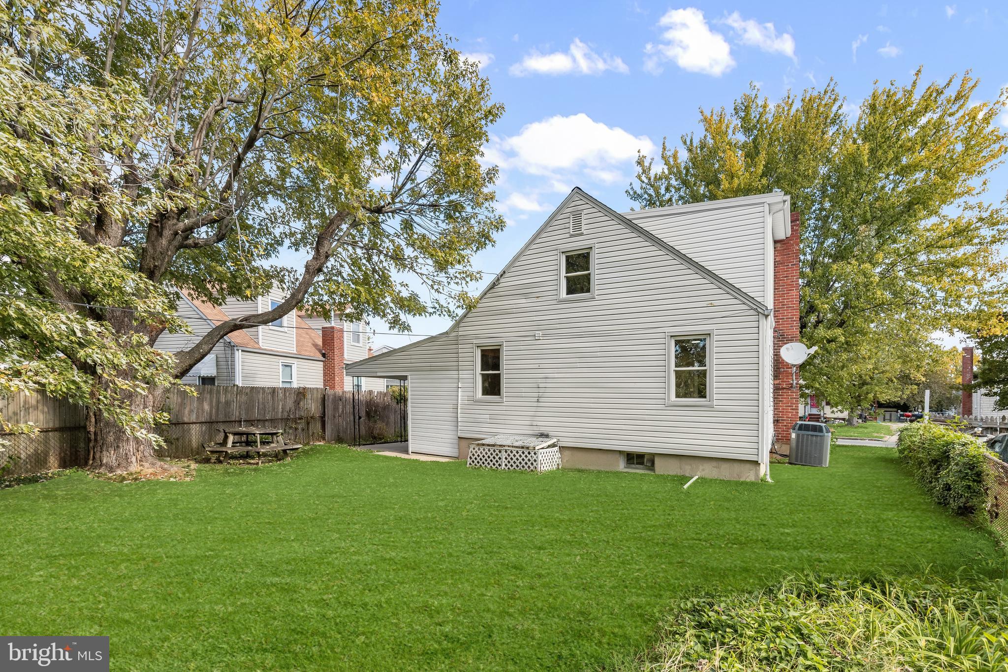 2608 Ambler Road Dundalk, MD 21222 - Photo 30 of 34 a view of a house with a yard