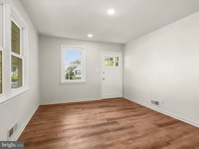 an empty room with windows