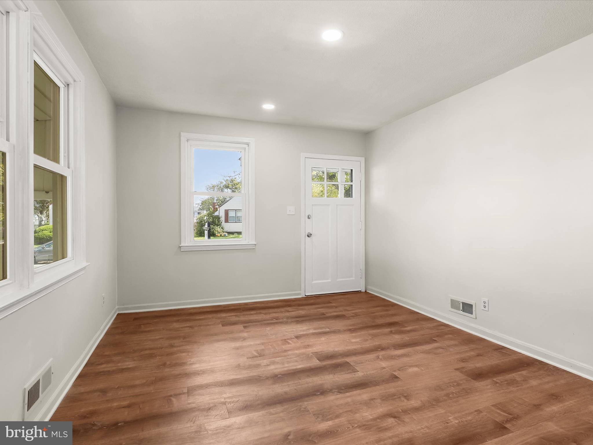 2608 Ambler Road Dundalk, MD 21222 - Photo 7 of 34 an empty room with windows