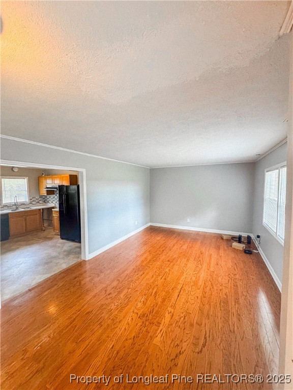 2879 County Line Road St. Pauls, NC 28384 - Photo 5 of 24 a view of empty room with wooden floor