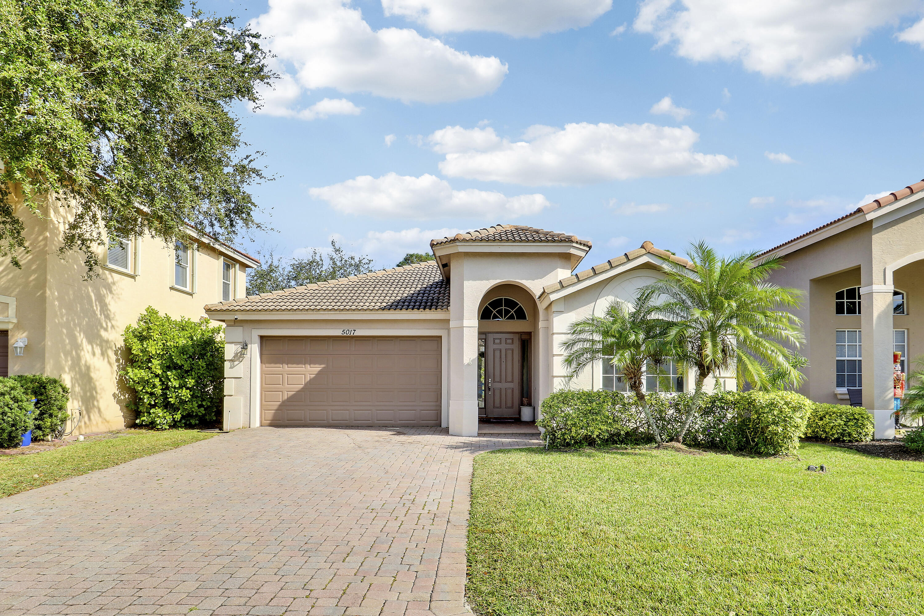 5017 Southeast Graham Drive Stuart, FL 34997 - Photo 3 of 38 front
