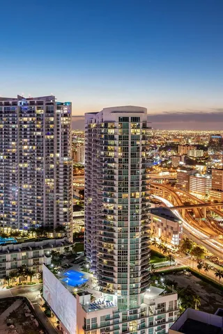 a view of swimming pool from a balcony