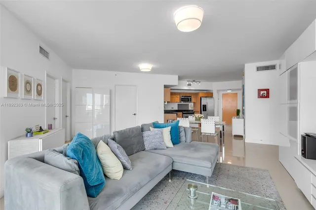 a living room with furniture and a couch