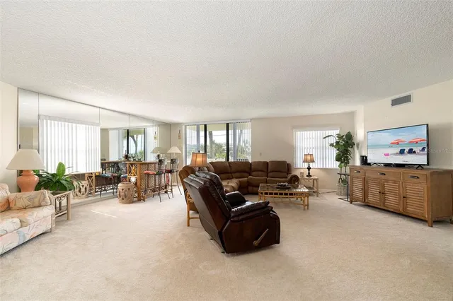 a view of multiple houses with a yard