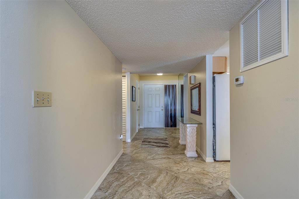 6500 Sunset Way, Unit 116 St. Pete Beach, FL 33706 - Photo 28 of 56 a view of hallway
