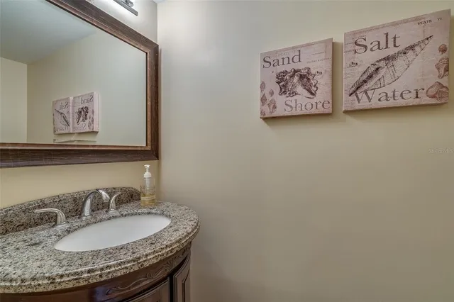 a view of a lake with a building in the background