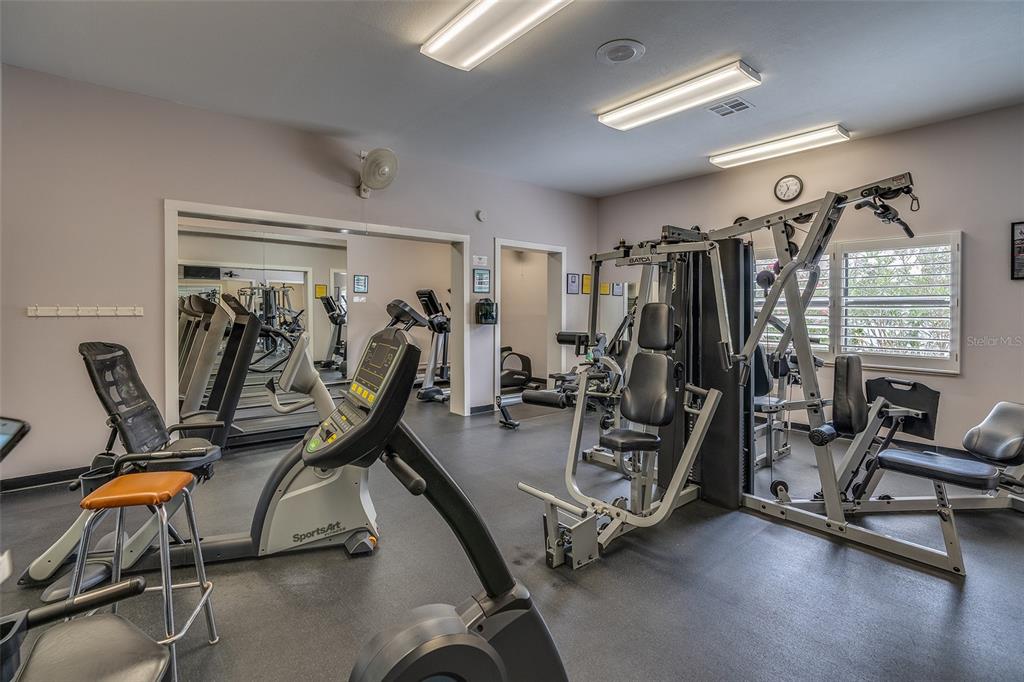 6500 Sunset Way, Unit 116 St. Pete Beach, FL 33706 - Photo 48 of 56 a view of a room with gym equipment