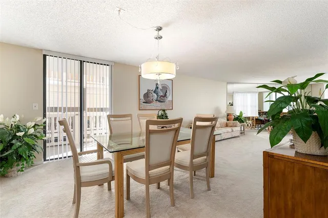 a kitchen with a sink cabinets and window
