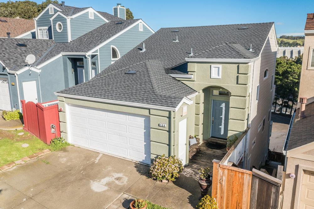 586 Alexis Circle Daly City, CA 94014 - Photo 1 of 61 a front view of a house with garden