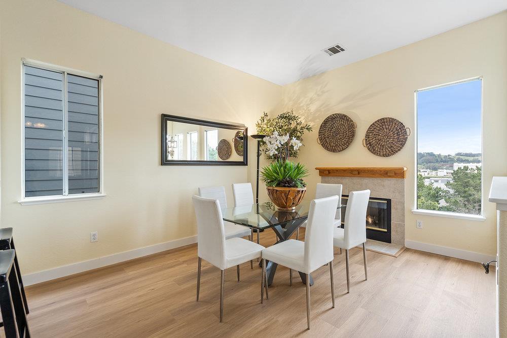 586 Alexis Circle Daly City, CA 94014 - Photo 15 of 61 a view of a dining room with furniture and a large window