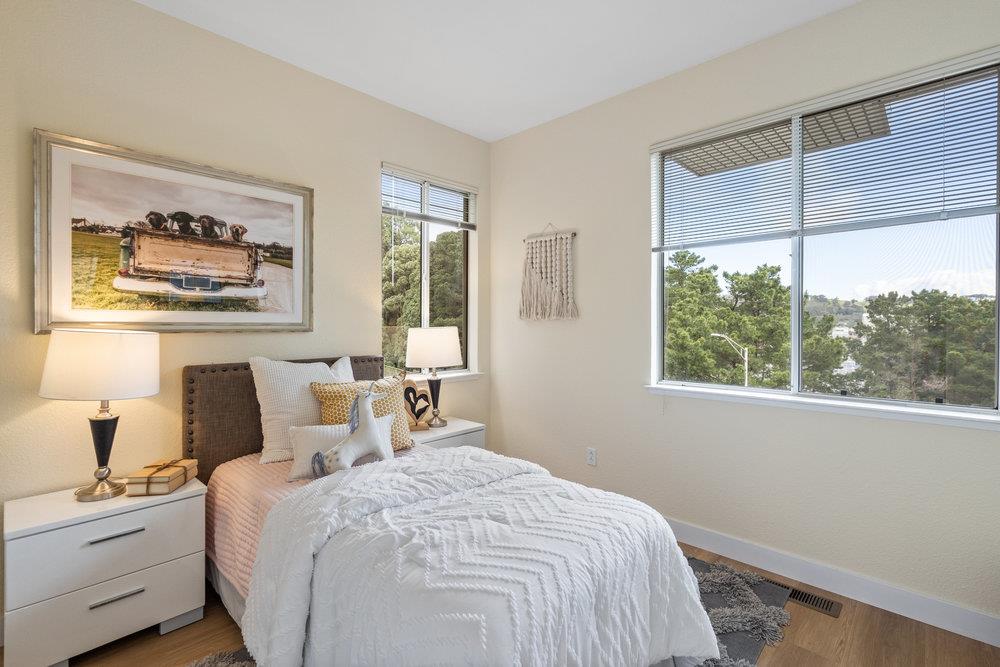 586 Alexis Circle Daly City, CA 94014 - Photo 25 of 61 a bedroom with a bed and a painting on the wall