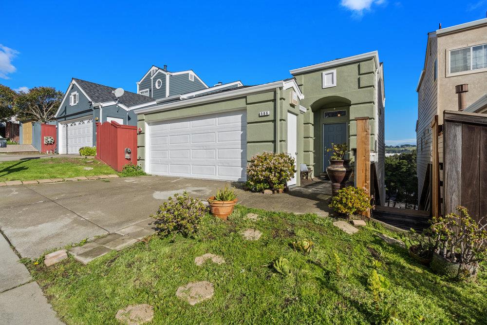 586 Alexis Circle Daly City, CA 94014 - Photo 4 of 61 a front view of a house with garden
