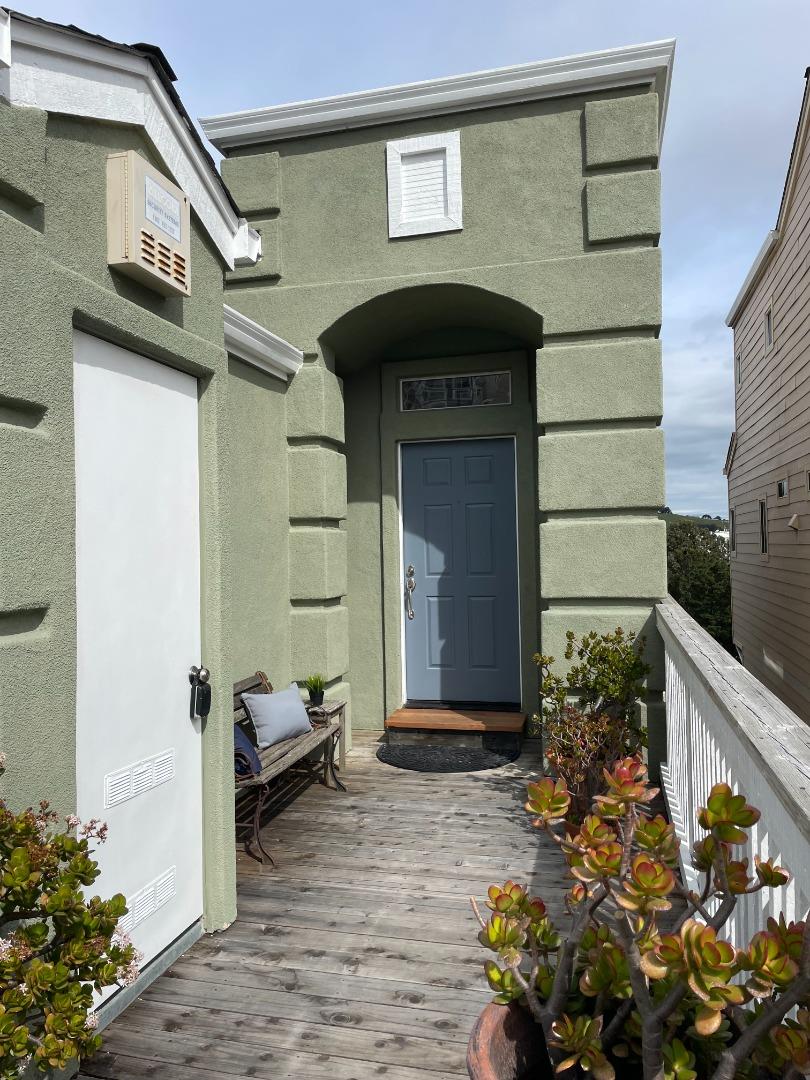 586 Alexis Circle Daly City, CA 94014 - Photo 5 of 61 a front view of a house with a garden