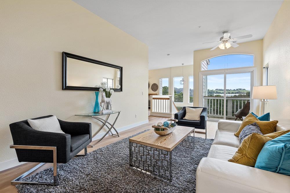 586 Alexis Circle Daly City, CA 94014 - Photo 9 of 61 a living room with furniture a rug and a chandelier