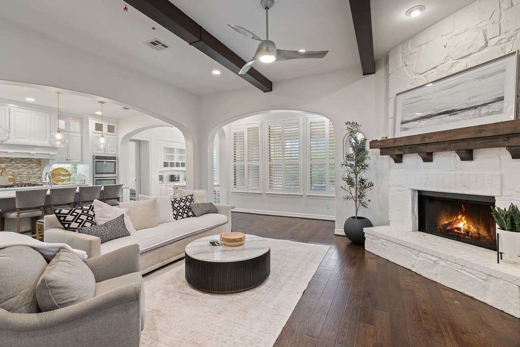 8801 Wild Rice Cove Austin, TX 78738 - Photo 6 of 40 a living room with furniture and a fireplace