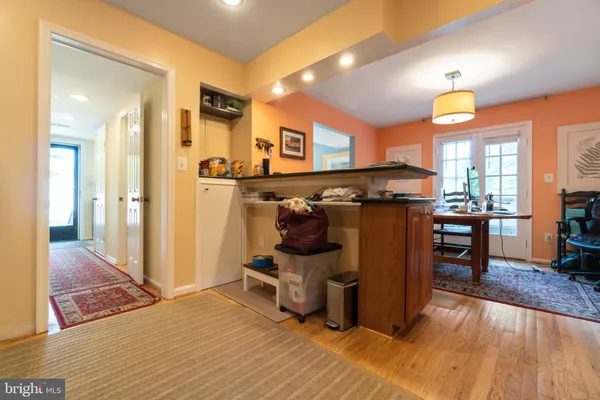 a view of a livingroom with furniture and wooden floor