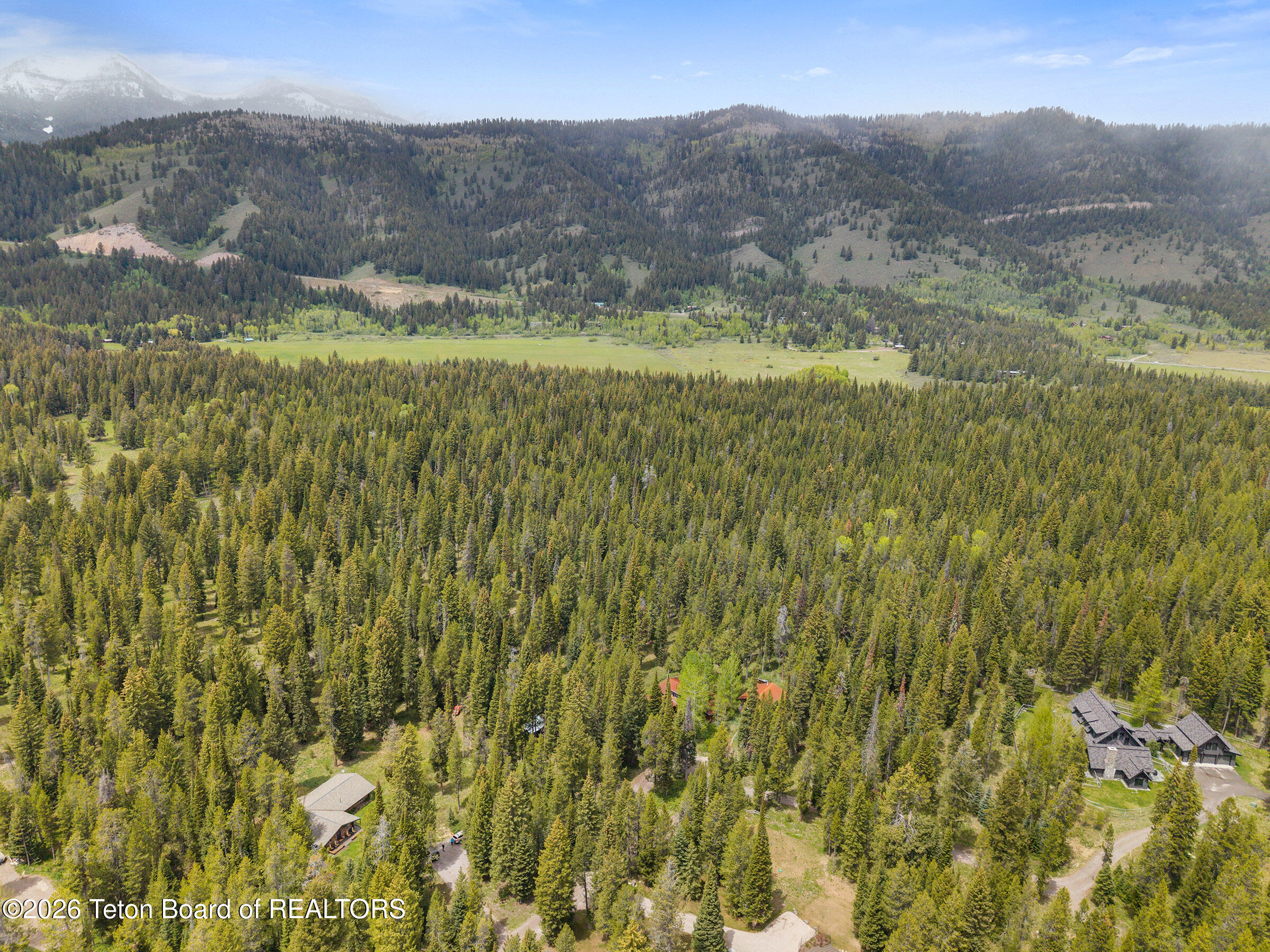 6475 Heck Of A Hill Road Wilson, WY 83014 - Photo 5 of 36 5 Drone View West_Email
