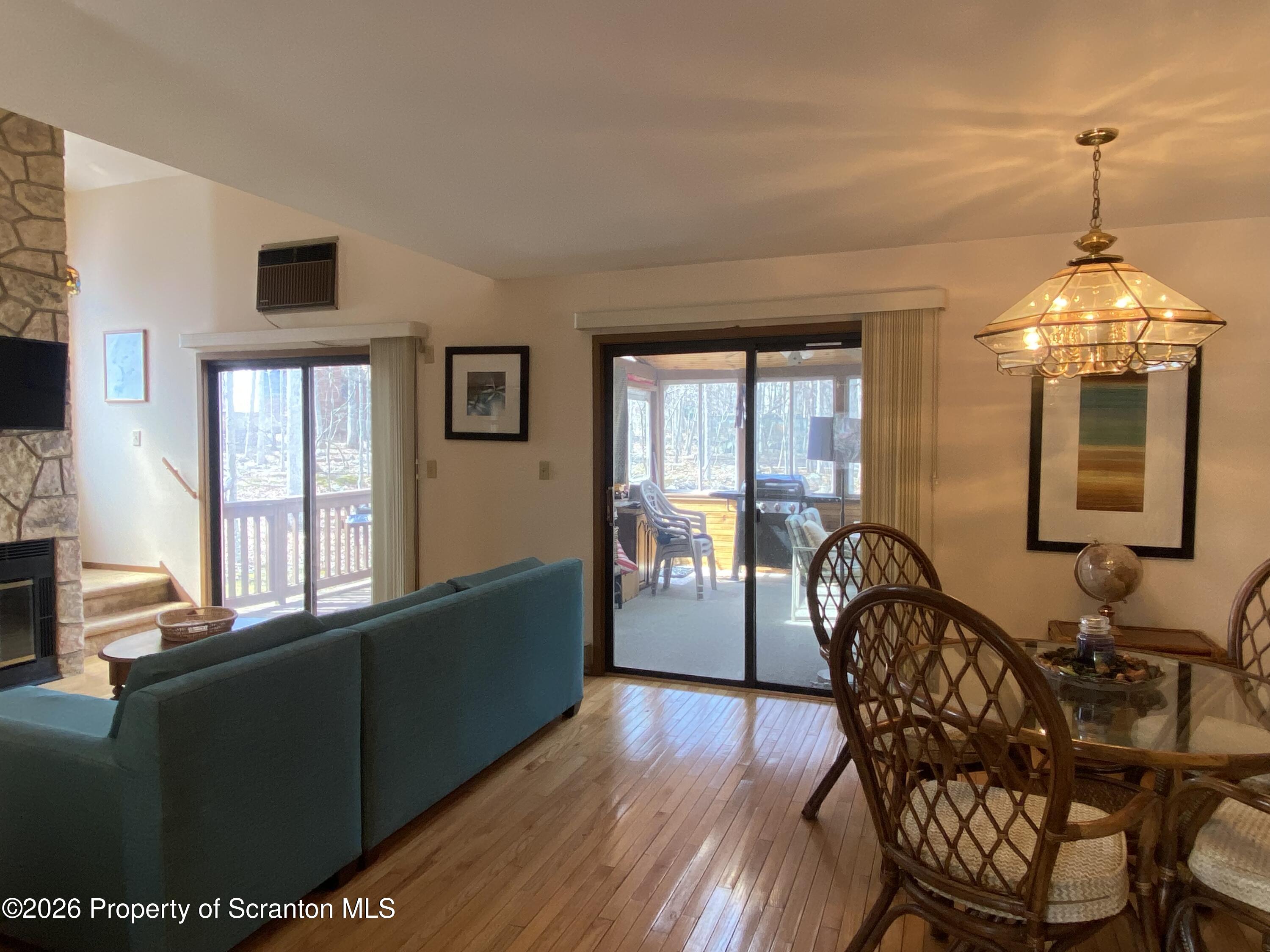 211 Falls Circle Bushkill, PA 18324 - Photo 24 of 28 a dining room with furniture and window