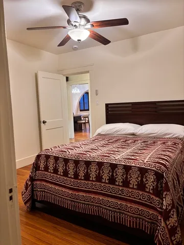 a view of front door with wooden floor