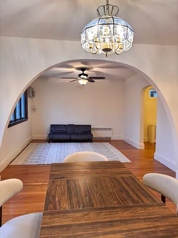 a view of staircase and kitchen view