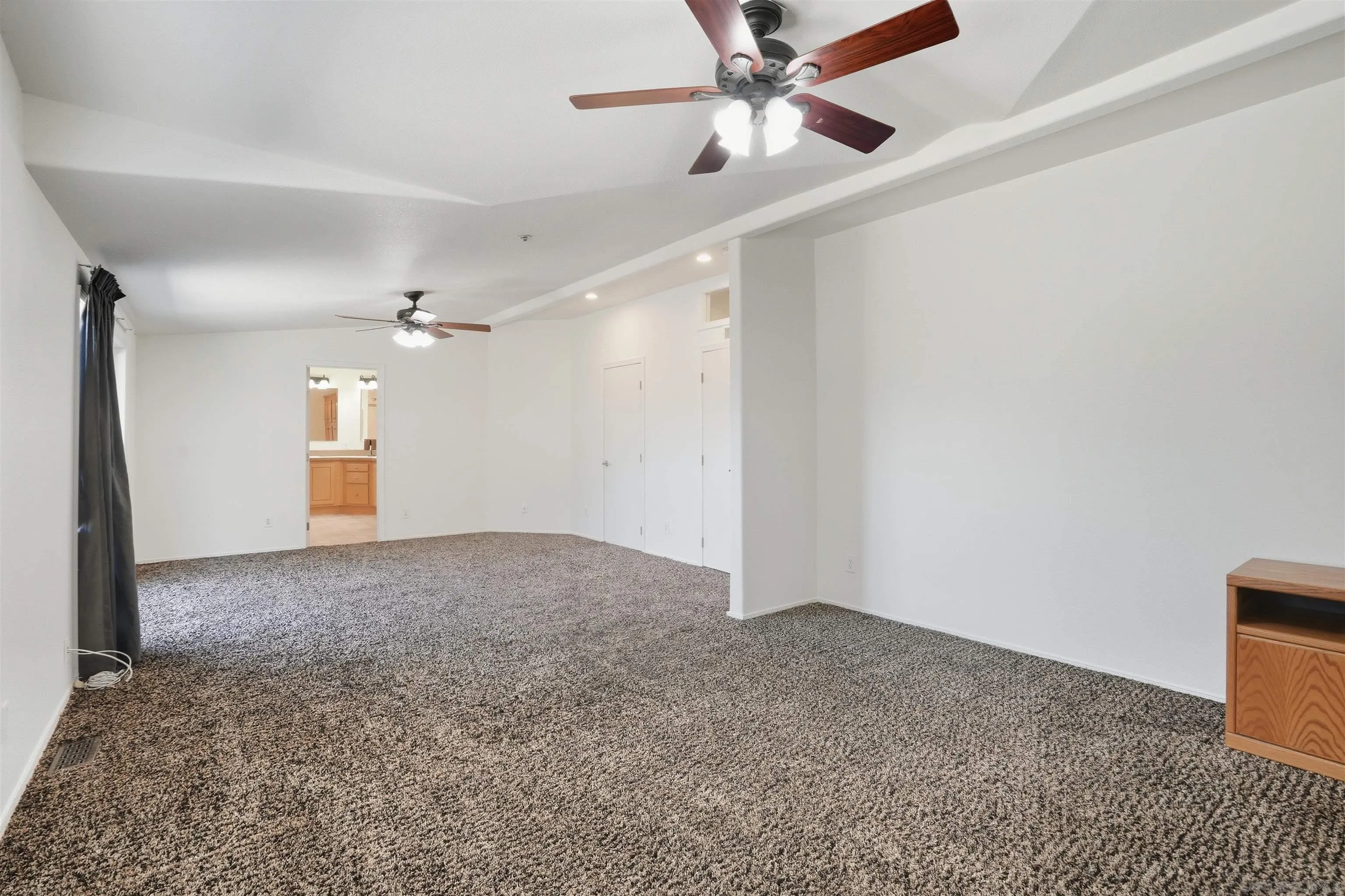 15453 Woods Valley Road Valley Center, CA 92082 - Photo 12 of 38 a view of an empty room and window